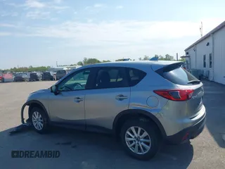 2014 Mazda CX-5 Touring with VIN JM3KE2CY9E0310315, listed as a IAAI auction lot 41943991 with 98,359 mi miles and . Bid and sale history available at carsss.com. Image 14.