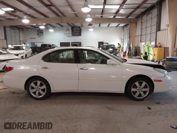 2005 Lexus ES 330 with VIN JTHBA30G955076779, listed as a IAAI auction lot 41622673 with 209,363 mi miles. Bid and sale history available at carsss.com. Image 13.