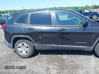 2015 Jeep Cherokee Sport z VIN 1C4PJMAB8FW610348, wystawiony jako IAAI lot #42532550 z przebiegiem 157 293 mil mil oraz . Historia ofert i sprzedaży dostępna na DreamBid. Obrazek 6.