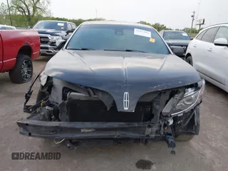 2013 Lincoln MKS with VIN 1LNHL9DK3DG612356, listed as a IAAI auction lot 42037862 with 116,193 mi miles and . Bid and sale history available at DreamBid. Image 13.