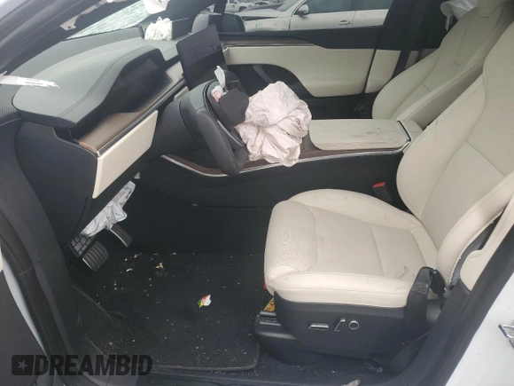 2023 Tesla Model X with VIN 7SAXCBE53PF380665, listed as a Copart auction lot 50799755 with Not Provided miles and Salvage Title. Bid and sale history available at DreamBid. Image 7.
