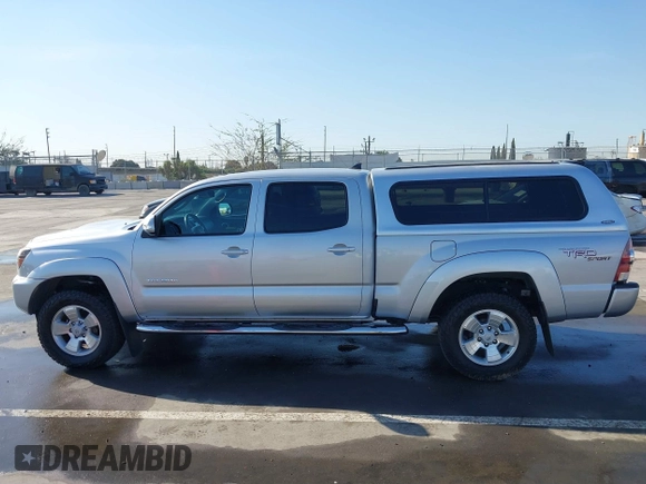 2013 Toyota Tacoma PreRunner with VIN 3TMKU4HN8DM034338, listed as a IAAI auction lot 41808842 with 142,012 mi miles and . Bid and sale history available at DreamBid. Image 14.