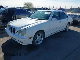 2002 Mercedes-Benz E-Class with VIN WDBJF82J62X076581, listed as a IAAI auction lot 41194976 with 235,453 mi miles. Bid and sale history available at carsss.com. Image 17.