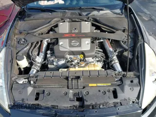 2014 Nissan 370Z Touring with VIN JN1AZ4EH1EM631097, listed as a IAAI auction lot 41230197 with 85,304 mi miles. Bid and sale history available at carsss.com. Image 10.
