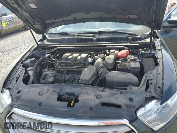 2014 Ford Taurus SEL with VIN 1FAHP2E87EG151866, listed as a Copart auction lot 52692965 with 201,680 mi miles and Clean Title. Bid and sale history available at DreamBid. Image 11.