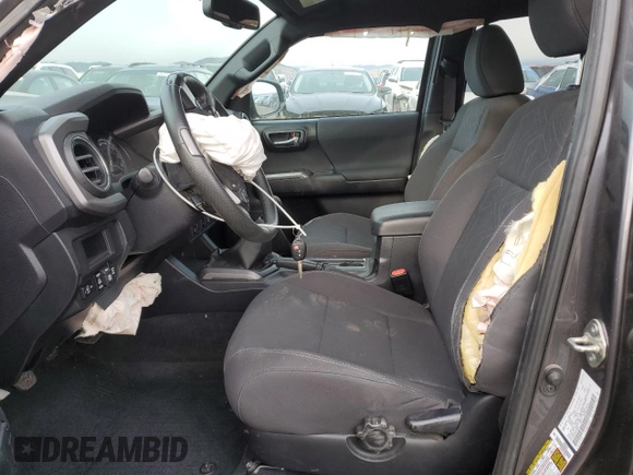 2017 Toyota Tacoma SR5 with VIN 5TFCZ5AN3HX070623, listed as a Copart auction lot 49602285 with 53,025 mi miles and Salvage title. Bid and sale history available at DreamBid. Image 7.