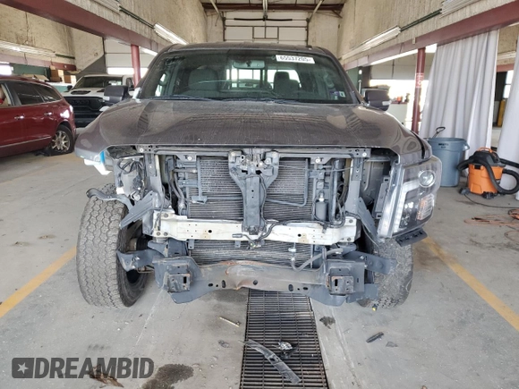 2018 Nissan Titan SV with VIN 1N6AA1E57JN515817, listed as a Copart auction lot 65537205 with 69,567 mi miles and Salvage title. Bid and sale history available at DreamBid. Image 5.