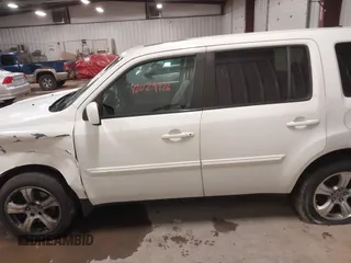 2015 Honda Pilot EX-L with VIN 5FNYF4H51FB019501, listed as a IAAI auction lot 42029926 with 170,755 mi miles and . Bid and sale history available at carsss.com. Image 14.