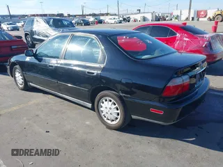 1997 Honda Accord EX with VIN 1HGCD5669VA219584, listed as a IAAI auction lot 41643524 with 161,820 mi miles and . Bid and sale history available at carsss.com. Image 3.