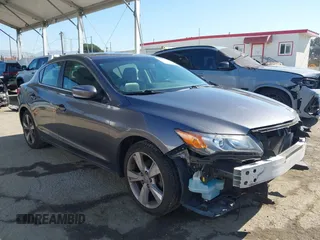2015 Acura ILX z VIN 19VDE1F33FE007026, wystawiony jako IAAI lot #41989891 z przebiegiem 128 601 mil mil oraz . Historia ofert i sprzedaży dostępna na DreamBid. Obrazek 1.