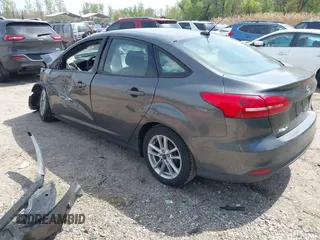 2017 Ford Focus SE with VIN 1FADP3F20HL335881, listed as a IAAI auction lot 42074241 with 127,741 mi miles. Bid and sale history available at carsss.com. Image 3.