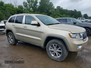 2011 Jeep Grand Cherokee Laredo z VIN 1J4RR4GG0BC562824, wystawiony jako Copart lot #61625445 z przebiegiem 166 490 mil mil oraz Czysty tytuł • Clean title. Historia ofert i sprzedaży dostępna na DreamBid. Obrazek 4.