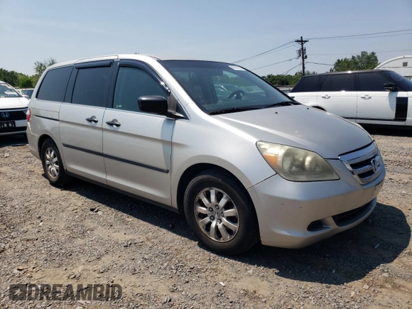 2007 Honda Odyssey LX with VIN 5FNRL38287B054504, listed as a Copart auction lot 59141665 with 128,617 mi miles and Salvage title. Bid and sale history available at DreamBid. Image 4.