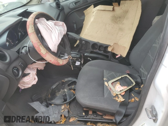 2015 Ford Fiesta S z VIN 3FADP4AJ0FM140721, wystawiony jako Copart lot #58148075 z przebiegiem 121 404 mil mil oraz Szkoda całkowita • Salvage title. Historia ofert i sprzedaży dostępna na DreamBid. Obrazek 7.
