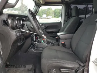 2019 Jeep Wrangler Unlimited Sport z VIN 1C4HJXDG4KW650546, wystawiony jako Copart lot #56553155 z przebiegiem 60 286 mil mil oraz Szkoda całkowita • Salvage title. Historia ofert i sprzedaży dostępna na DreamBid. Obrazek 7.