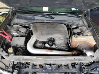 2014 Dodge Charger SXT with VIN 2C3CDXJG2EH211164, listed as a Copart auction lot 68972554 with 125,539 mi miles and Salvage Title. Bid and sale history available at carsss.com. Image 12.