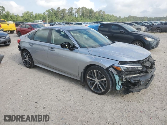 2023 Honda Civic Touring z VIN 2HGFE1F92PH323562, wystawiony jako Copart lot #54060205 z przebiegiem 20 504 mil mil oraz Czysty tytuł • Clean title. Historia ofert i sprzedaży dostępna na DreamBid. Obrazek 4.