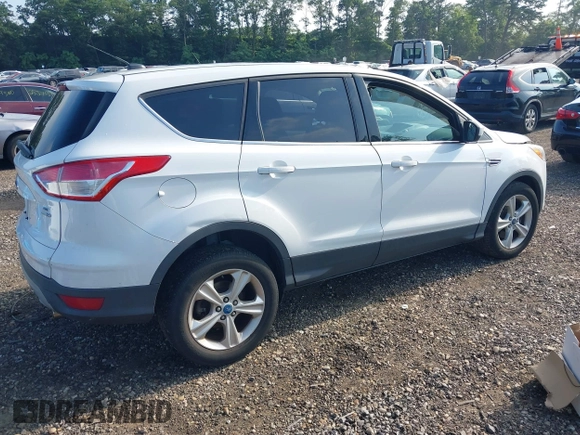 2013 Ford Escape SE with VIN 1FMCU9GX4DUB59039, listed as a IAAI auction lot 42722871 with 93,188 mi miles and . Bid and sale history available at DreamBid. Image 4.