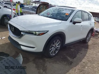 2019 Mazda CX-5 Grand Touring with VIN JM3KFBDM8K0518576, listed as a IAAI auction lot 41854296 with 88,706 mi miles and . Bid and sale history available at carsss.com. Image 2.
