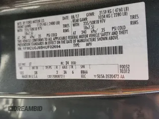 2017 Ford Escape Titanium with VIN 1FMCU0J95HUF02694, listed as a Copart auction lot 49861745 with 114,602 mi miles and Salvage Title. Bid and sale history available at DreamBid. Image 14.