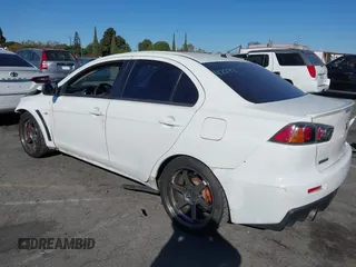 2012 Mitsubishi Lancer Evolution MR with VIN JA32W5FV3CU009679, listed as a IAAI auction lot 40787549 with 167,206 mi miles. Bid and sale history available at carsss.com. Image 3.