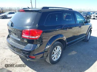 2016 Dodge Journey SXT with VIN 3C4PDCBGXGT123087, listed as a IAAI auction lot 41869667 with 256,583 mi miles. Bid and sale history available at carsss.com. Image 4.