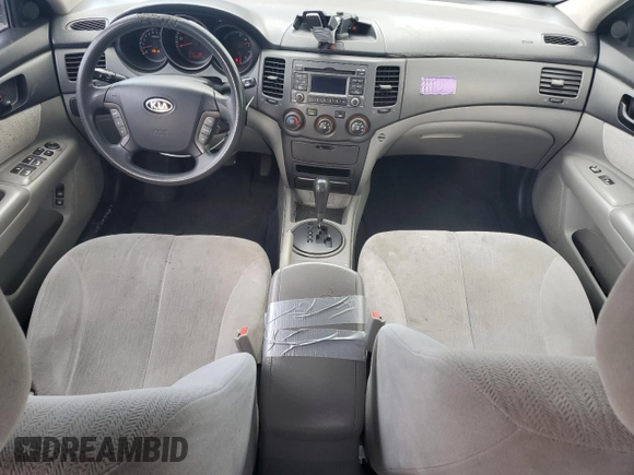 2010 Kia Optima LX z VIN KNAGG4A80A5398981, wystawiony jako Copart lot #59092515 z przebiegiem 153 524 mil mil oraz Szkoda całkowita • Salvage title. Historia ofert i sprzedaży dostępna na DreamBid. Obrazek 8.