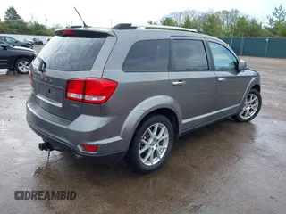 2012 Dodge Journey Crew z VIN 3C4PDCDG9CT146593, wystawiony jako IAAI lot #42127303 z przebiegiem 137 861 mil mil oraz . Historia ofert i sprzedaży dostępna na DreamBid. Obrazek 4.