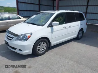 2007 Honda Odyssey EX-L with VIN 5FNRL38787B144585, listed as a IAAI auction lot 42139957 with 211,412 mi miles and . Bid and sale history available at DreamBid. Image 2.
