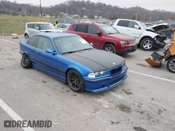 1999 BMW 3 Series M3 with VIN WBSBG9336XEY80979, listed as a IAAI auction lot 41179676 with 262,233 mi miles. Bid and sale history available at carsss.com. Image 1.