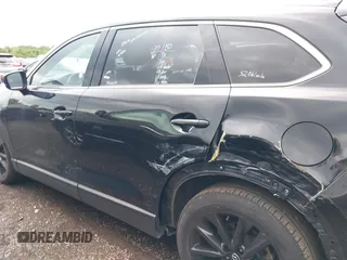 2023 Mazda CX-9 Touring Plus with VIN JM3TCBAY2P0657825, listed as a IAAI auction lot 42756562 with 52,090 mi miles and . Bid and sale history available at DreamBid. Image 14.