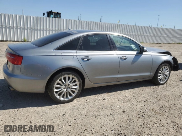2014 Audi A6 with VIN WAUHGCFC6EN137629, listed as a Copart auction lot 65671144 with Not provided miles and Salvage title. Bid and sale history available at DreamBid. Image 3.