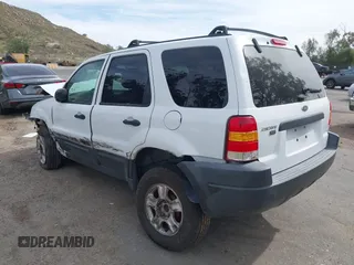 2004 Ford Escape XLT with VIN 1FMYU03134KA80217, listed as a IAAI auction lot 41672764 with 184,601 mi miles. Bid and sale history available at carsss.com. Image 3.