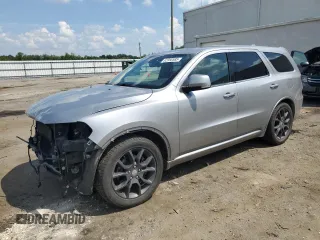 2016 Dodge Durango R/T with VIN 1C4SDJCT0GC467582, listed as a Copart auction lot 62360585 with 134,853 mi miles and Salvage title. Bid and sale history available at DreamBid. Image 1.