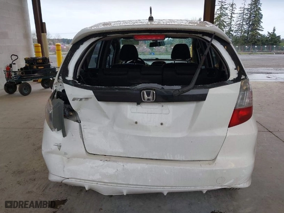 2013 Honda Fit Sport with VIN JHMGE8H51DC055865, listed as a IAAI auction lot 41904400 with 280,556 mi miles. Bid and sale history available at carsss.com. Image 6.