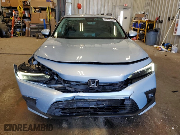 2022 Honda Civic Touring z VIN 2HGFE1F9XNH301080, wystawiony jako Copart lot #55320125 z przebiegiem 47 767 mil mil oraz Szkoda całkowita • Salvage title. Historia ofert i sprzedaży dostępna na DreamBid. Obrazek 5.