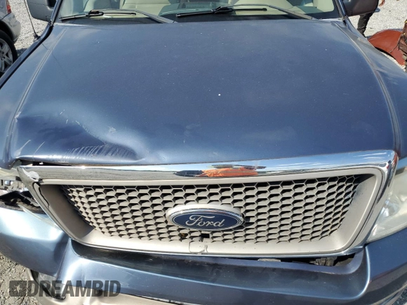 2005 Ford F-150 XLT with VIN 1FTPX12555NA08341, listed as a Copart auction lot 55214075 with 182,059 mi miles and Salvage title. Bid and sale history available at DreamBid. Image 11.