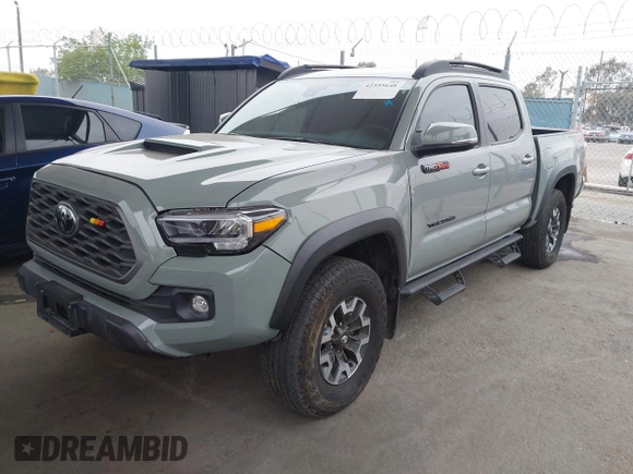 2023 Toyota Tacoma SR z VIN 3TMCZ5AN1PM602567, wystawiony jako IAAI lot #42355648 z przebiegiem 32 472 mil mil oraz . Historia ofert i sprzedaży dostępna na DreamBid. Obrazek 20.