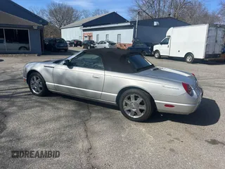 2004 Ford Thunderbird Deluxe with VIN 1FAHP60A84Y104095, listed as a IAAI auction lot 41872502 with 116,642 mi miles. Bid and sale history available at carsss.com. Image 3.