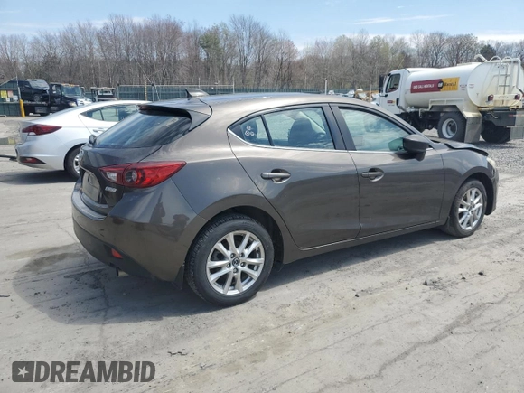 2014 Mazda 3 i Grand Touring with VIN JM1BM1M79E1142889, listed as a Copart auction lot 53263345 with 146,606 mi miles and Salvage Title. Bid and sale history available at DreamBid. Image 3.