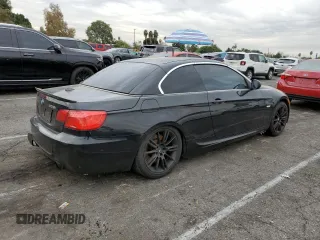2011 BMW 3 Series 335i with VIN WBADX7C59BE743322, listed as a Copart auction lot 84219074 with 94,623 mi miles and Salvage Title. Bid and sale history available at carsss.com. Image 3.
