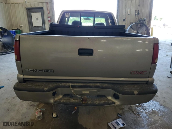 2003 GMC Sonoma SLS with VIN 1GTDT19X038102919, listed as a Copart auction lot 63662154 with 0 mi miles and Salvage Title. Bid and sale history available at carsss.com. Image 6.
