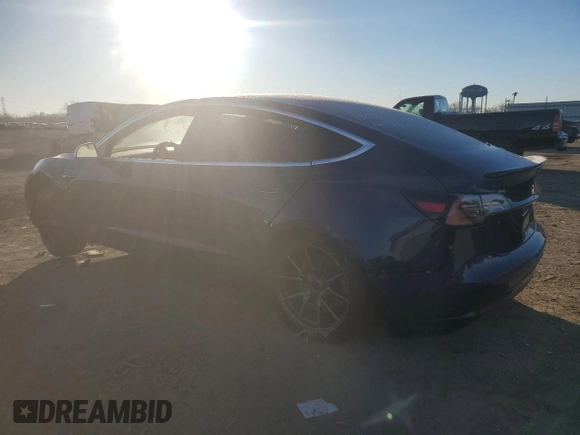 2018 Tesla Model 3 Long Range Battery with VIN 5YJ3E1EB9JF075202, listed as a Copart auction lot 87616115 with 76,881 mi miles and Salvage Title. Bid and sale history available at DreamBid. Image 2.