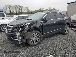 2017 Cadillac XT5 Premium Luxury FWD z VIN 1GYKNCRS3HZ107173, wystawiony jako Copart lot #51063335 z przebiegiem 97 240 mil mil oraz Szkoda całkowita • Salvage title. Historia ofert i sprzedaży dostępna na DreamBid. Obrazek 1.