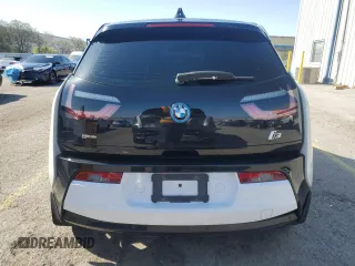 2014 BMW i3 with VIN WBY1Z4C51EV276642, listed as a Copart auction lot 52571115 with 112,178 mi miles and Salvage title. Bid and sale history available at DreamBid. Image 6.