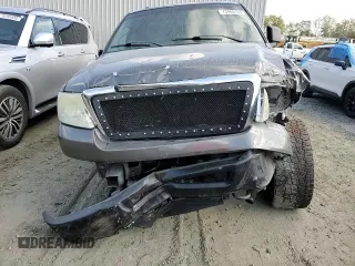 2007 Ford F-150 XL with VIN 1FTRF14V37KC39137, listed as a Copart auction lot 73463164 with 150,331 mi miles and Salvage title. Bid and sale history available at DreamBid. Image 11.