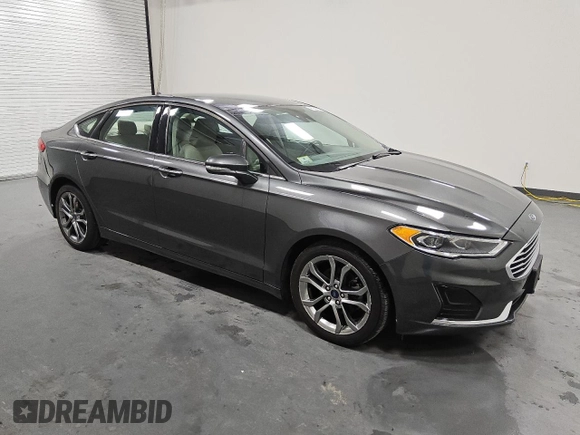 2020 Ford Fusion SEL with VIN 3FA6P0CD9LR137274, listed as a Copart auction lot 57070035 with 65,707 mi miles and Clean title. Bid and sale history available at DreamBid. Image 4.