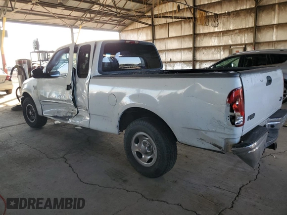 2000 Ford F-150 XL with VIN 1FTRX17W1YNB88948, listed as a Copart auction lot 83114404 with 288,100 mi miles and Salvage Title. Bid and sale history available at carsss.com. Image 2.