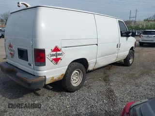 2010 Ford Econoline Cargo Commercial with VIN 1FTNE1EW1ADA91736, listed as a IAAI auction lot 42005782 with 306,746 mi miles and . Bid and sale history available at carsss.com. Image 4.