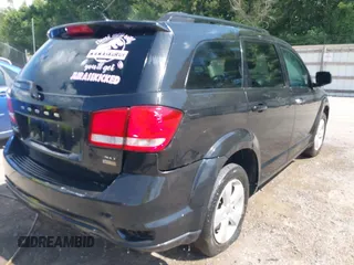 2012 Dodge Journey SXT with VIN 3C4PDCBG0CT352887, listed as a IAAI auction lot 42618786 with 201,008 mi miles and . Bid and sale history available at DreamBid. Image 6.